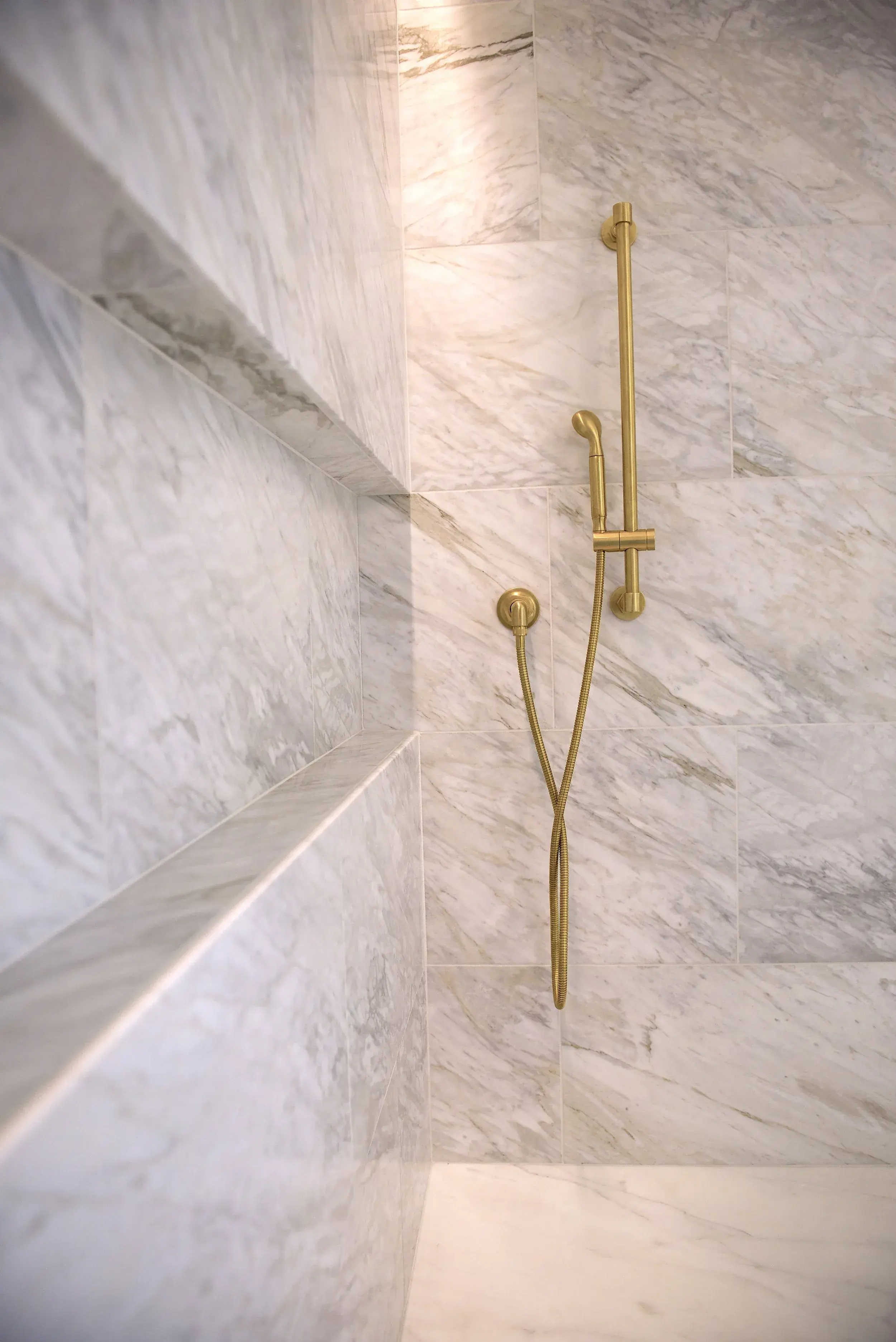 Custom tile shower with gold hardware, Austin