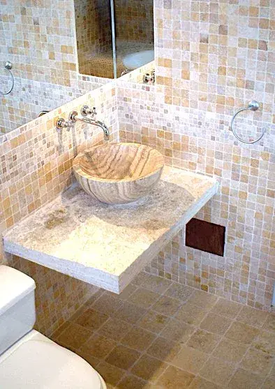 Mosaic wall tile backsplash above sink, Austin